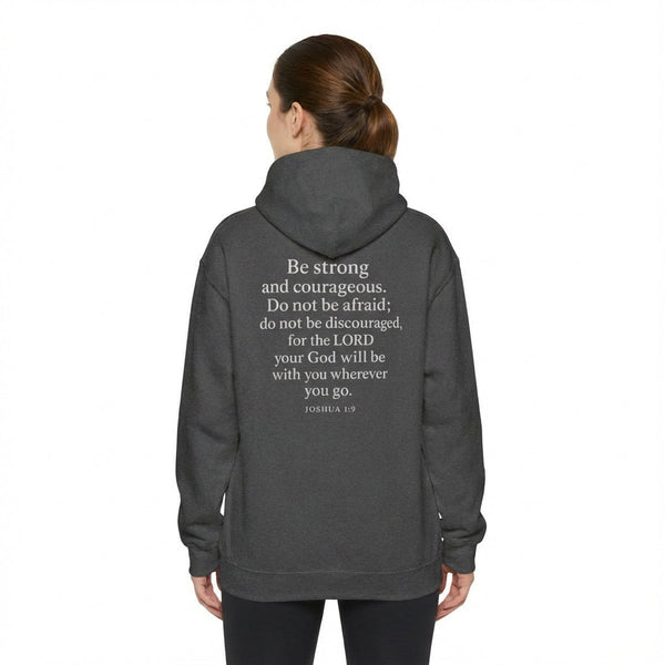 Dark gray Christian hoodie featuring the Joshua 1:9 Scripture design on the back in white text.